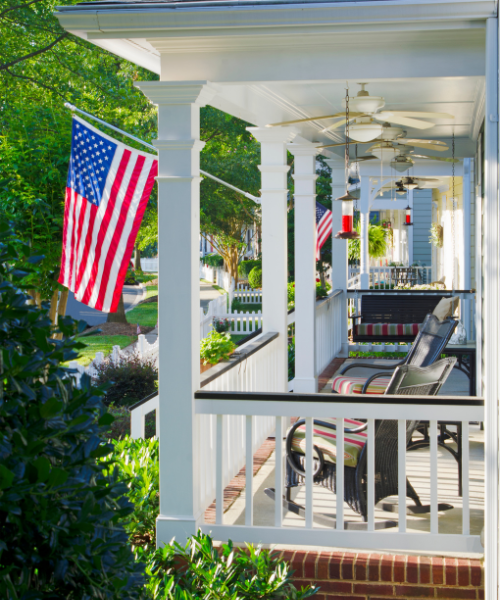 A porch with an american flag on it